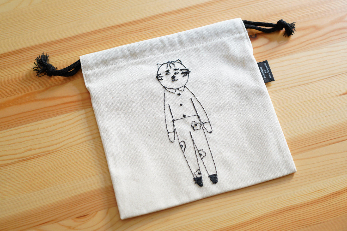 sennokoto by Shion Sugawara | 巾着 両面刺繍 / 花柄ネコ